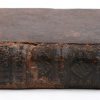 Twee oude boeken in lederen band: - “Sacrosancti et oecumenici concilii tridentini”. Antwerpen, 1644.- “Dwalende rave huiten de arke van Noë”. Antwerpen, 1757.