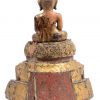 Een deels vergulde houten Boeddha.