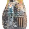 Een terracotta bierpul met meerkleurig geglazuurd reliëfdecor van een havenzicht en het handvat in de vorm van een zeemeermin. Onderaan gemerkt.