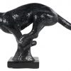 “Lopende panter” een modern beeld met zwarte glasfragmenten op laaster (?)