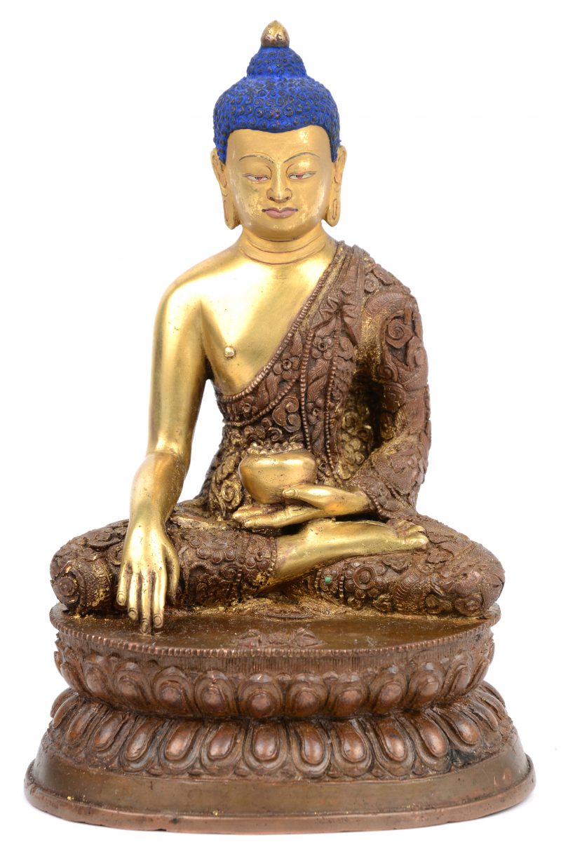 Een Tibetaanse bronzen Boeddha.