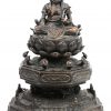 Een zittende Boeddha op lotusbloem. Japan. Kleine beschadiging aan de bevestiging achteraan.