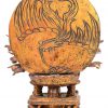 Een verguld houten beeld van een Quan Yin met duizend armen, als onderdeel van een Zushi-kastje. Japans werk.