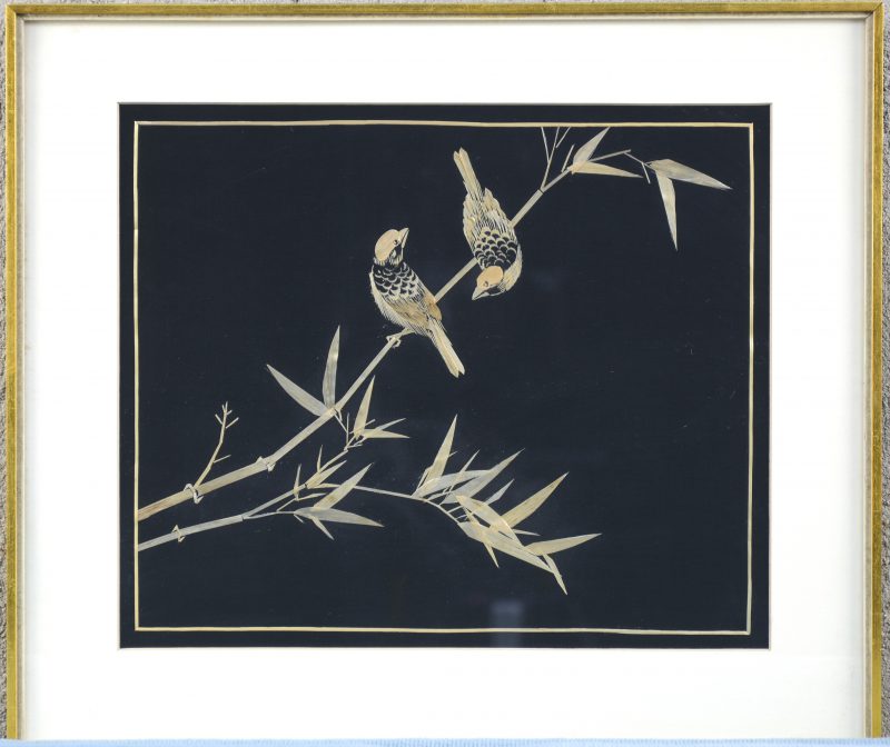 “Vogels in het riet”. Chinees kunstwerk gemaakt uit grashalmen.