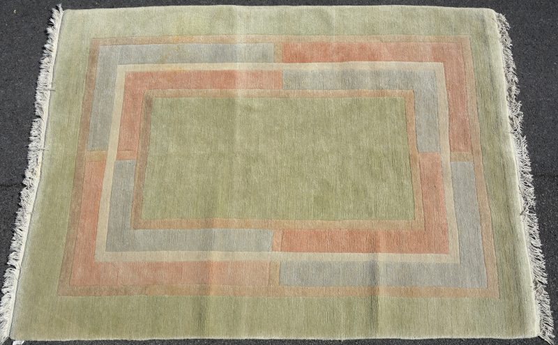 Een Tibetaans wollen tapijt.