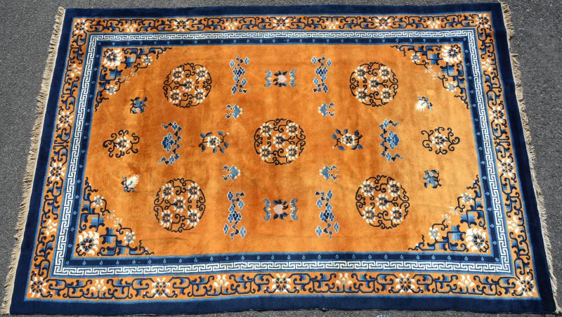Een Chinees wollen tapijt.