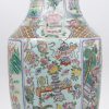 Een vaas van Chinees porselein met meerkleurig decor van rituele keizerlijke scènes en kostbaarheden. Onderaan gemerkt.