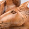 “Vrouw- en paardenhoofd”. Een uit een massief blok regenboomhout gesneden kunstwerk. Gesigneerd en met certificaat.