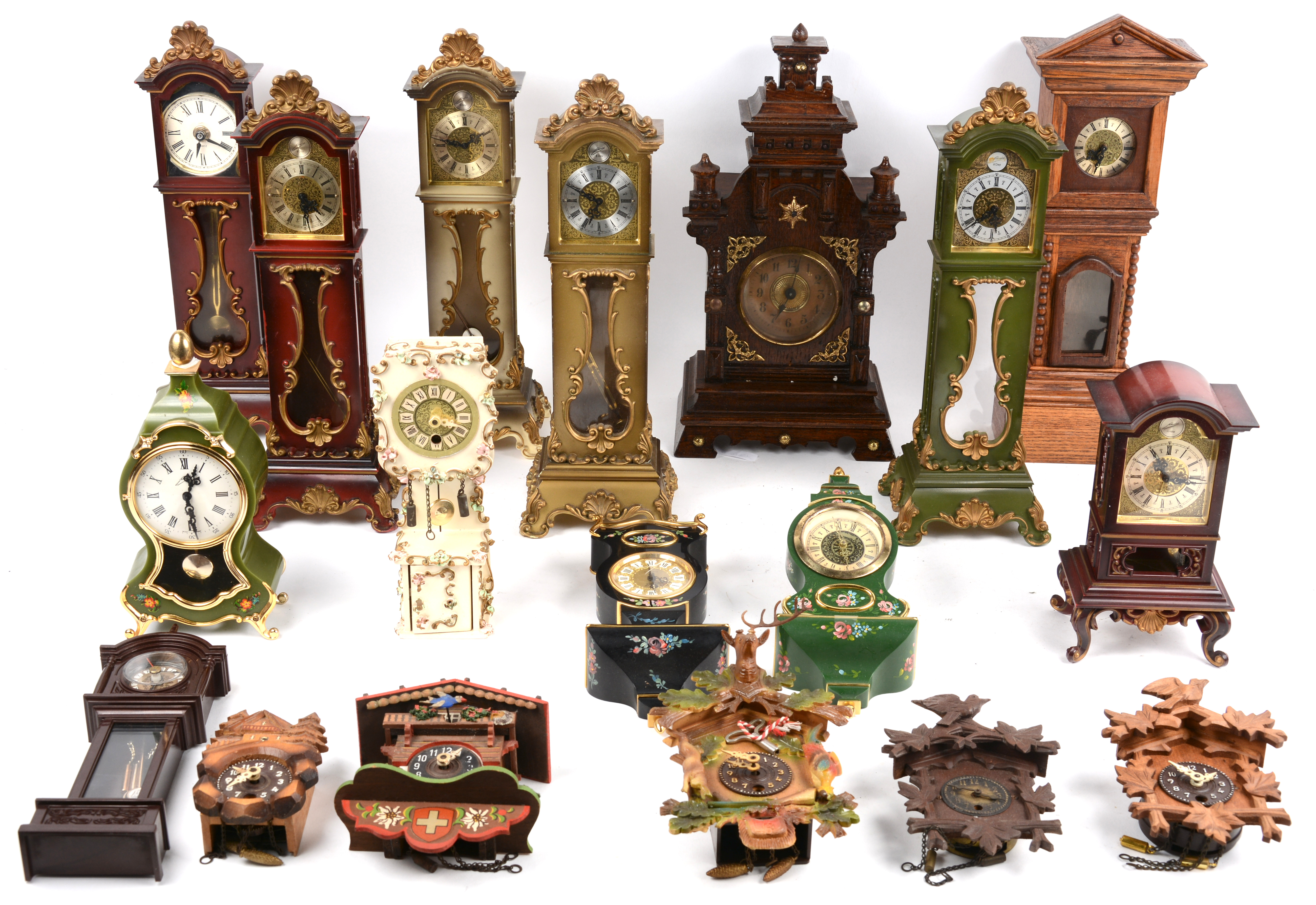 Een groot lot miniatuur klokjes. Waaronder klokken, koekoeksklokken – Jordaens N.V. Veilinghuis