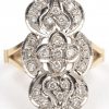 Art nouveau ring van 18 K wit en geelgoud bezet met diamanten met een gezamenlijk gewicht van +- 0,35 ct.