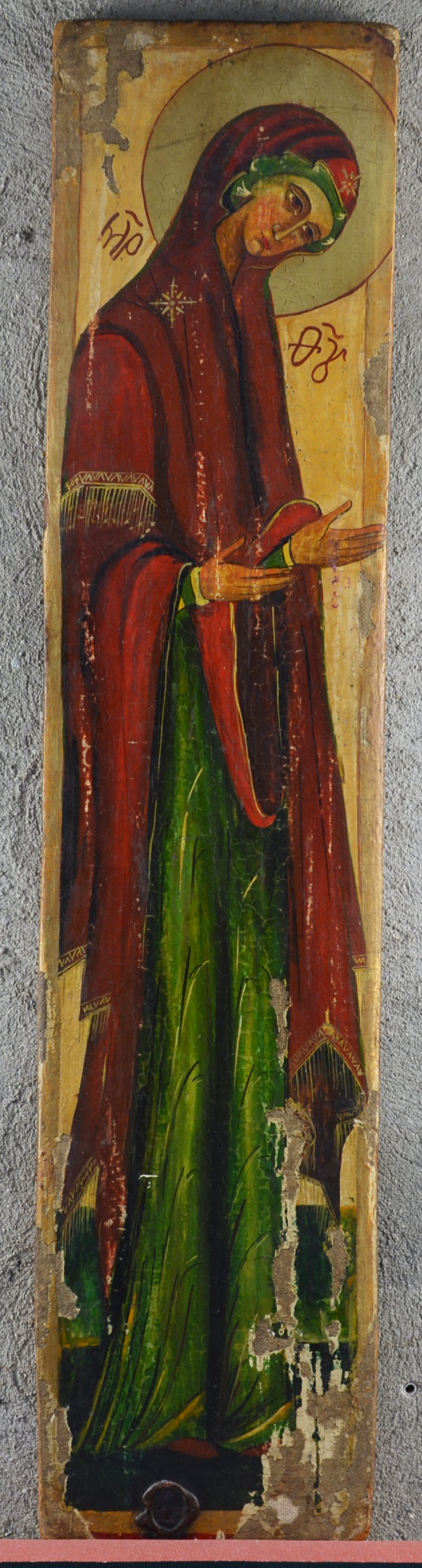 “Heilige Madonna”. Een langwerkpig handgeschilderd icoon op doek. Rusland. Met wassen exportstempel.