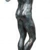 “De bronstijd”. Een beeld van groengepatineerd brons naar een werk van Rodin.