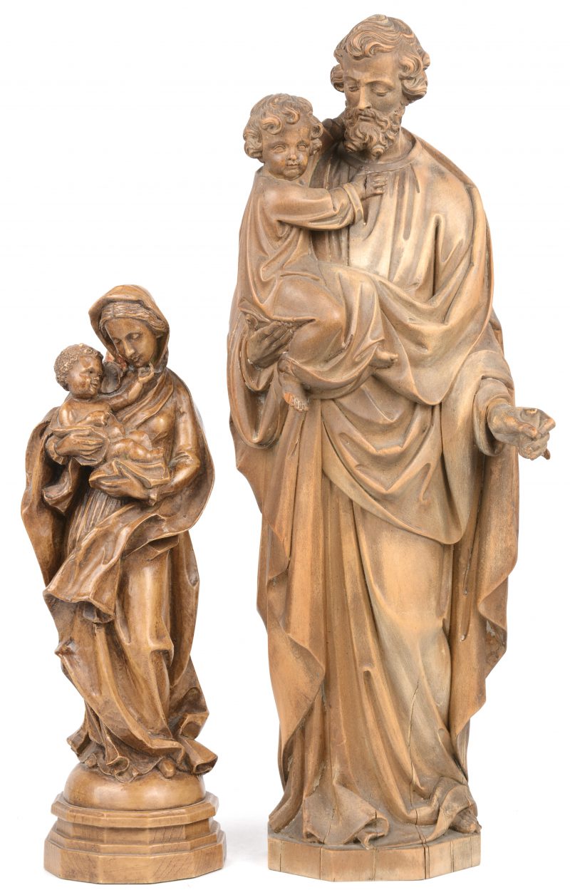 Een neobarokke Sint-Jozef met Kind van gebeeldhouwd lindenhout (palmtak manco) en een dito, kleinere Madonna met kind (hoofd hersteld). Omstreeks 1900.