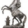 “De paardenmenner”. Een beeld van kunstbrons naar “Les chevaux de Marly van Coustou.