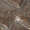 “La bonne recette”. Een bruingepatineerd bronzen beeld naar het werk van Emile Carlier.