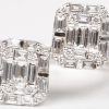 “Toi et Moi”. Een 18 K witgouden ring bezet met diamant baguetten en briljanten met een gezamenlijk gewicht van +- 1,20 ct.
