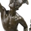 “Mercurius”. Een bronzen beeld op een sokkel van roze marmer en brons, versierd met een reliëfdecor in een fries. Naar een werk van Jean de Bologne.