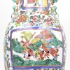 Een balustervaas van Chinees porselein met meerkleurig famille-rosedecor.