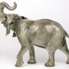 Een Afrikaanse olifant van meerkleurig porselein. Gemerkt. No. 36018.