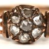 Een 18 K geelgouden ring bezet met diamant oude slijp met een gezamenlijk gewicht van +- 0,35 ct.