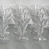 Een geslepen kleurloos kristallen glasservies, bestaande uit wittewijnglazen, rodewijnglazen, waterglazen en champagnecoupes. Compleet voor twaalf personen. Model Val Saint Lambert.