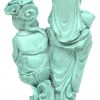 Een beeldje van gesculpteerd turkoois in de vorm van een Guan-Yin en een voorstelling van Boeddha. Handjes gebroken en in het midden gelijmd.