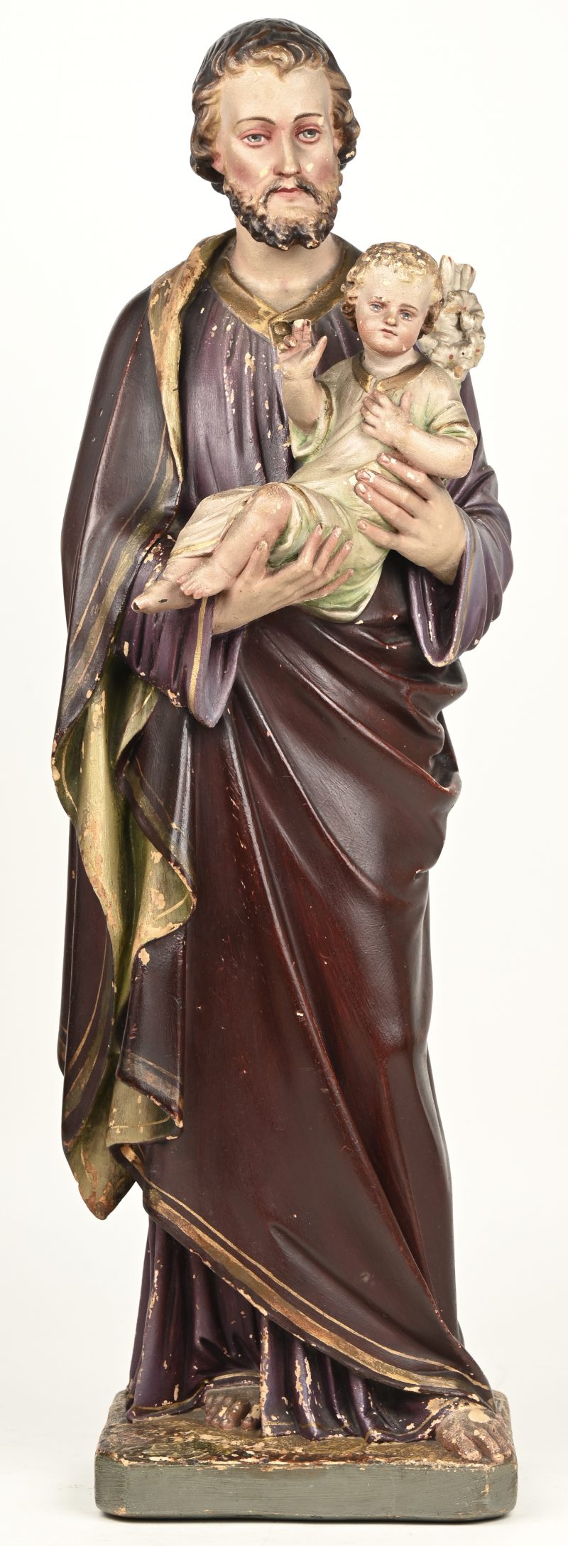 “Sint Jozef met Jezus”. Een gepolychromeerd plaasteren beeld.