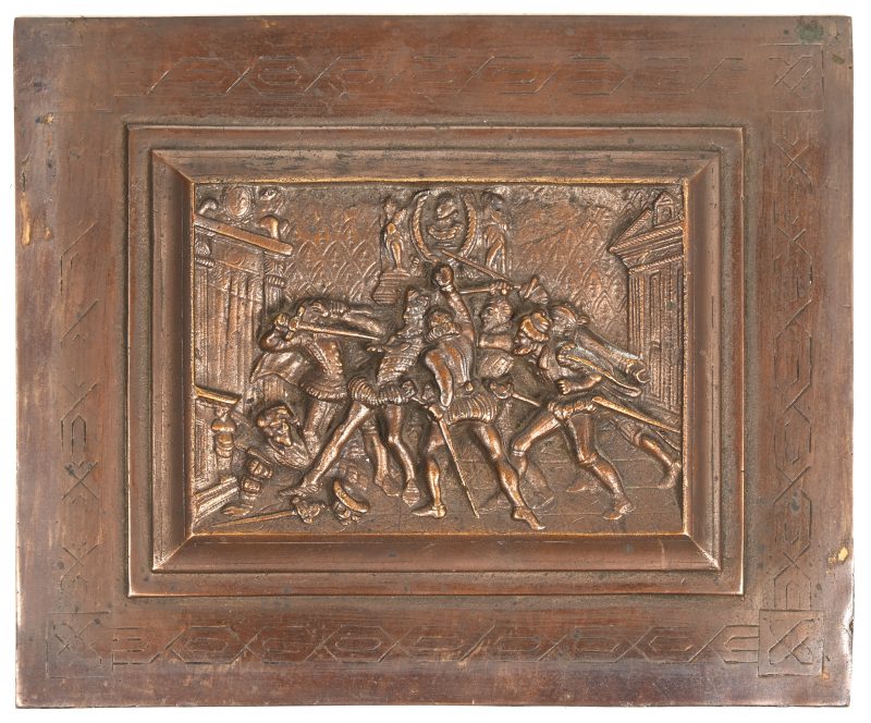 Een bronzen plaquette met de voorstelling van de moord op Willem van Oranje.