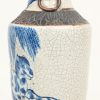 Een blauw en witte Nankin vaas, decoratie met paard en boom. Nek hersteld met koperen ring.