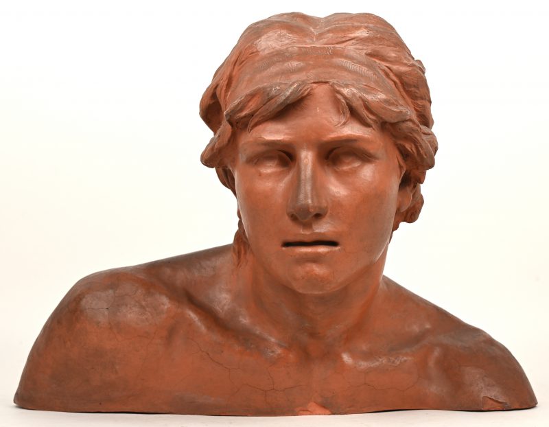 Een buste in terracotta door Jef De Keyser met schilferschade onderaan .Achteraan gesigneerd J. De Keyser .