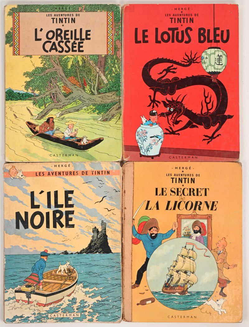 Een lot van vier albums: “Le Secret de la Licorne.”, “L’Oreille Cassée”, “Le Lotus Blue.’, ‘L’ile Noire.’.