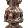 “Voorouderpaar”. Een dubbelzijdig beeld in gesculptuurd hout, Fang, Gabon.