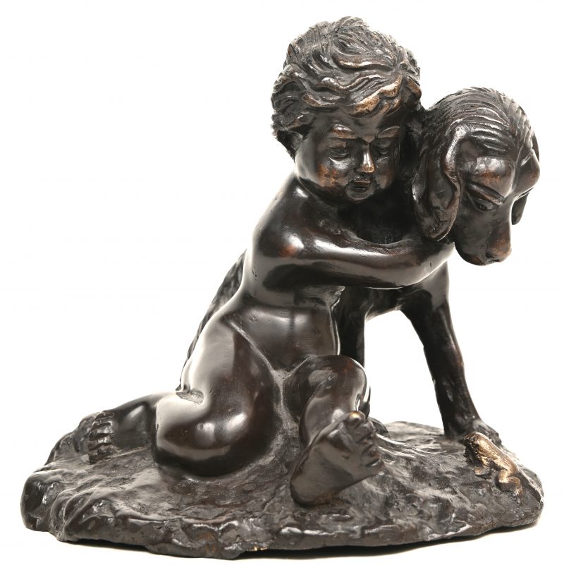 “Jongen met hond en kikker.” Bronzen beeld. Naar Jozef D’Aste.