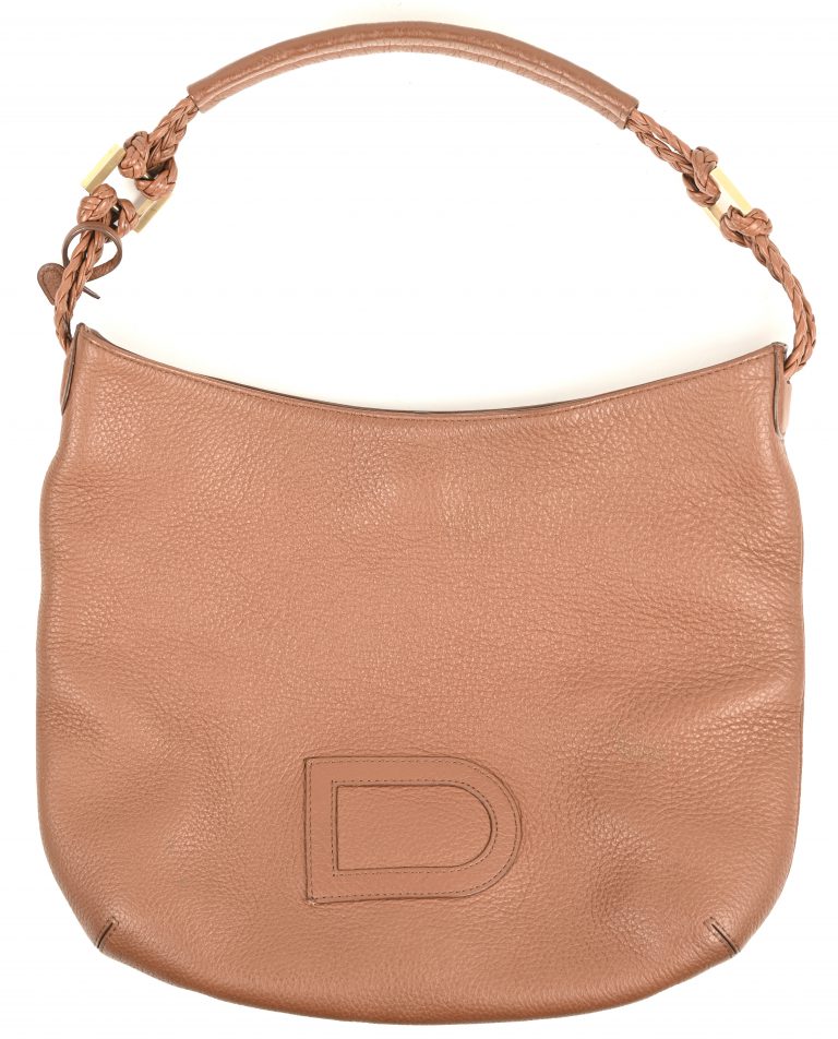 Een vintage lederen Delvaux handtas met stofhoes. Vermoedelijk model