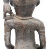 Een antiek Nigeriaans houten vruchtbaarheidsbeeld met spiegeltje.