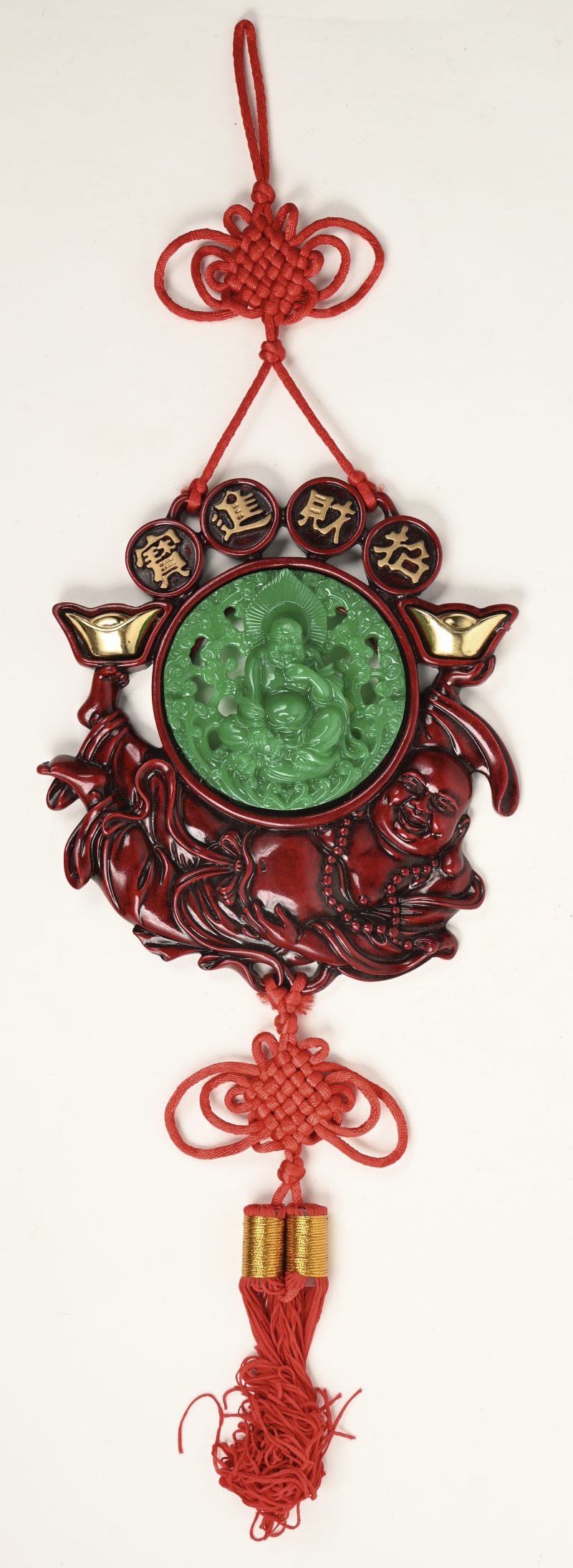 Een kunststof wandornament met 2 buddha afbeeldingen?