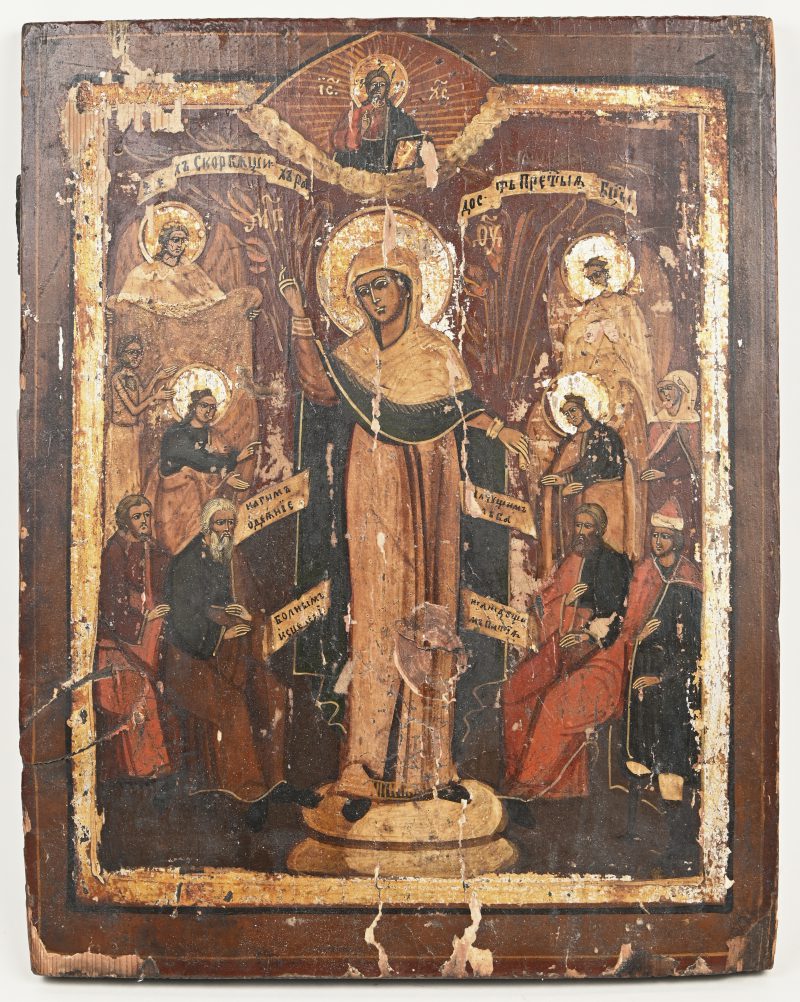 Een antiek handgeschilderd Rusisch icoon met beeltenis van de Moeder Gods en diverse Heiligen. XIXe eeuw.