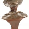 “Le Sifleur”. Een buste in gepatineerd brons. Gesigneerd “Marcel Debut”.