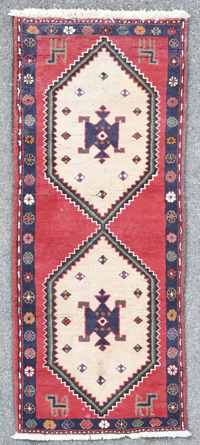 Een Iraans handgeknoopt tapijt, genummerd 60860.