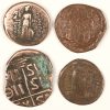 Vier verschillende Romeinse koperen munten. Constantinople Romanus III.1028-1034. Roman imperial ConstantineI AD 307-337. Justin II and Sophia 565-578. Tyche Greek Parthia 246-239.