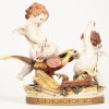 ‘2 engeltjes met fazant’, een porceleinen beeld onderaan gemerkt Algora made in Spain en genummerd B.2565.