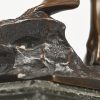 “Germanischer Krieger”. Een brons gesculpteerd beeld van een krijger met gehoornde hoofdtooi. Op donker marmeren sokkel. Draagt signatuur.