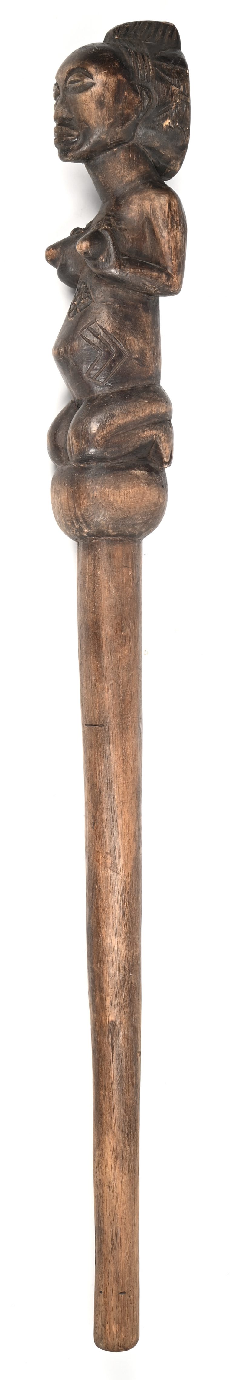 Een houten staf van een stamhoofd.