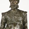“André Vesale” door I. De Rudder. Een bronzel beeld met de beeltenis van André in zijn atelier.