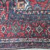 Een Iraans handgeknoopt nomaden tapijt, gemerkt Bidjar, gestilleerd decor met warme kleuren. Met certificaat.