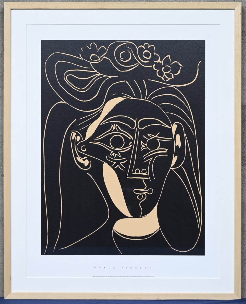 “Femme au chapeau fleuri”. Een print op papier, naar het werk van Picasso.