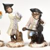 Een lot van 8 porseleinen monkey band figuurtjes. 5 met breukschade.