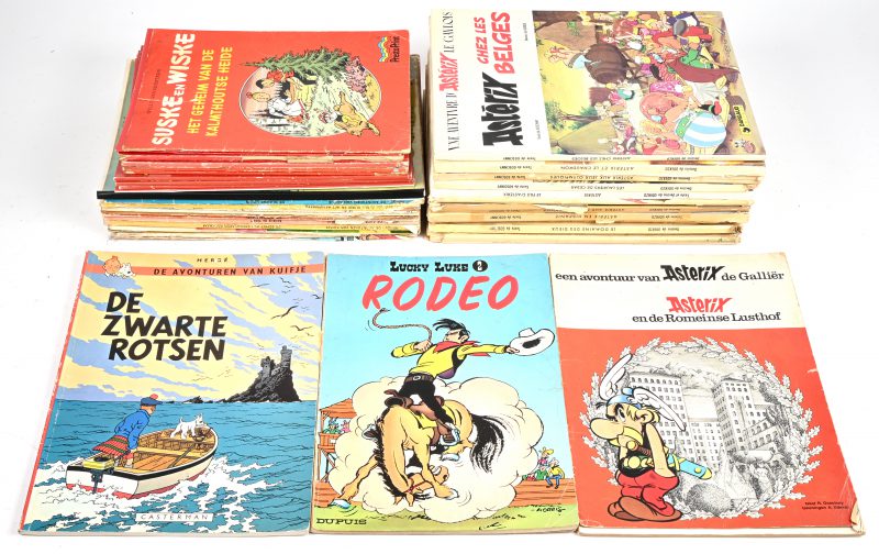 Een lot van 34 stripalbums waaronder Asterix, HC in het Frans, verder Kuifje, Lucky Luke, Suske & Wiske en andere.