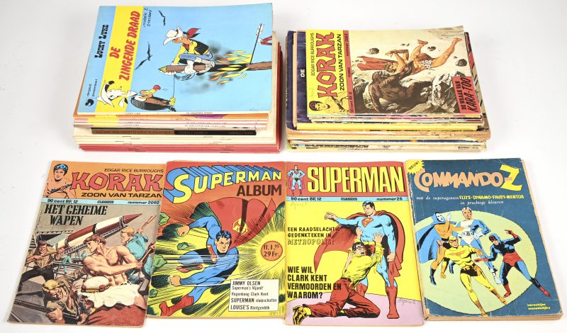 Een lot van 33 strips en comics bestaande uit 5 Lucky Luke’s, 6 Buck Danny’s, 4 x De Timoers, 9 comics waaronder Superman, Korak e.a., 1 boek over Star Wars en 8 kleefplaatboeken van superchocolade Jacques.