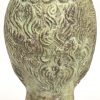 Een brons gesculpteerd hoofd van een bebaard figuur met opening aan bovenzijde en 2 kleine gaatjes aan de zijkant.